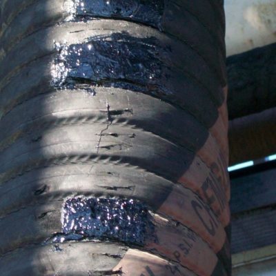 Reparatur mit Armierungsgewebe und Belzona 2111 (D&A Hi-Build Elastomer)