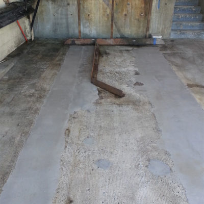 Deteriorated concrete of an unloading area repaired with Belzona 4154 and overcoated with Belzona 4131