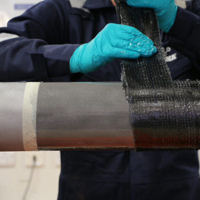 Application of the Belzona 9381 reinforcement sheet building to the correct thickness